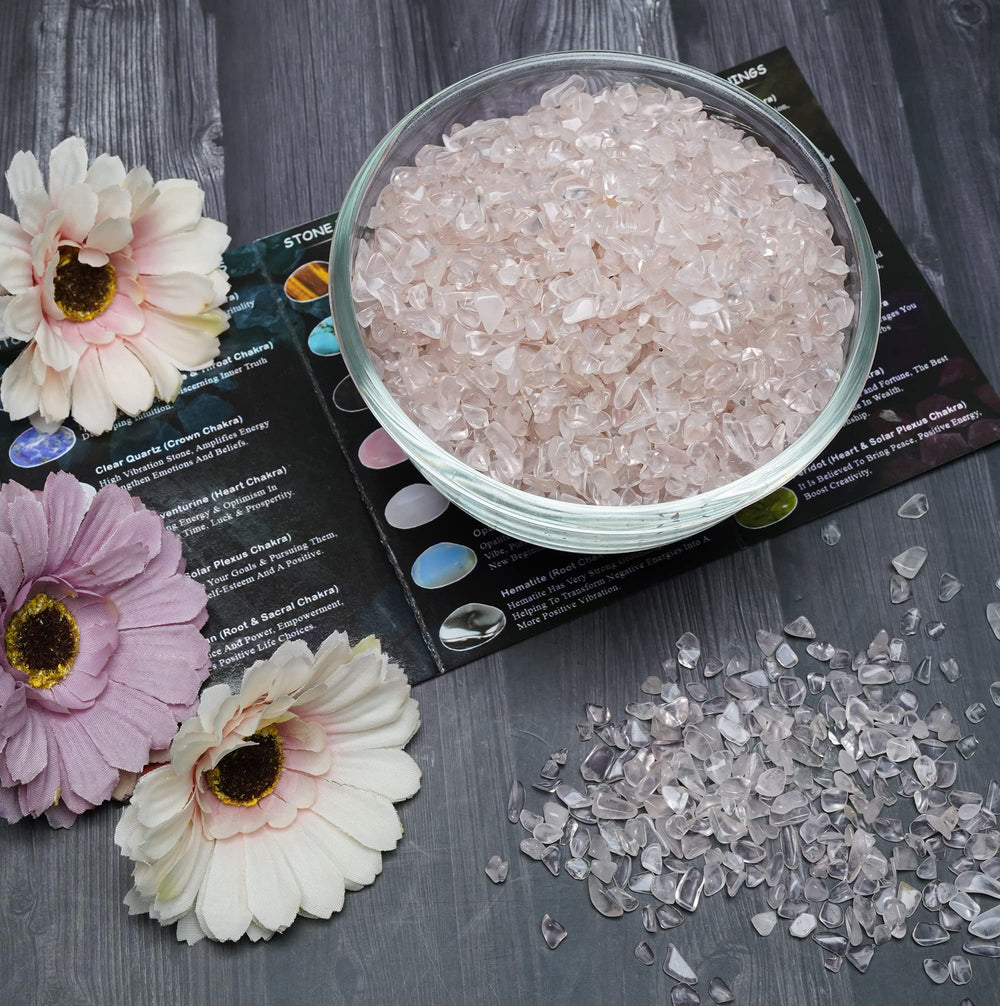 ZAICUS Rose Quartz chips used as aquarium decor with soft pink shimmer.