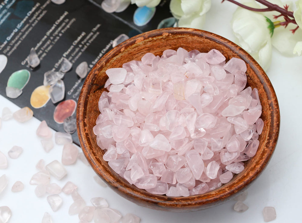 ZAICUS Rose Quartz chips in a wishing bottle for display.