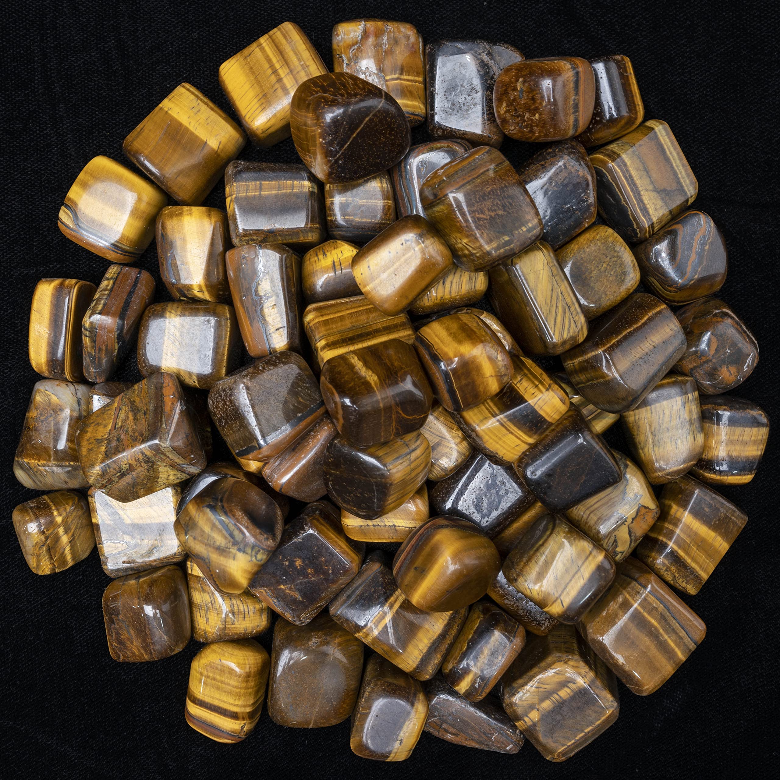 ZAICUS Tiger Eye tumbled stones close-up with warm glow for chakra balancing.