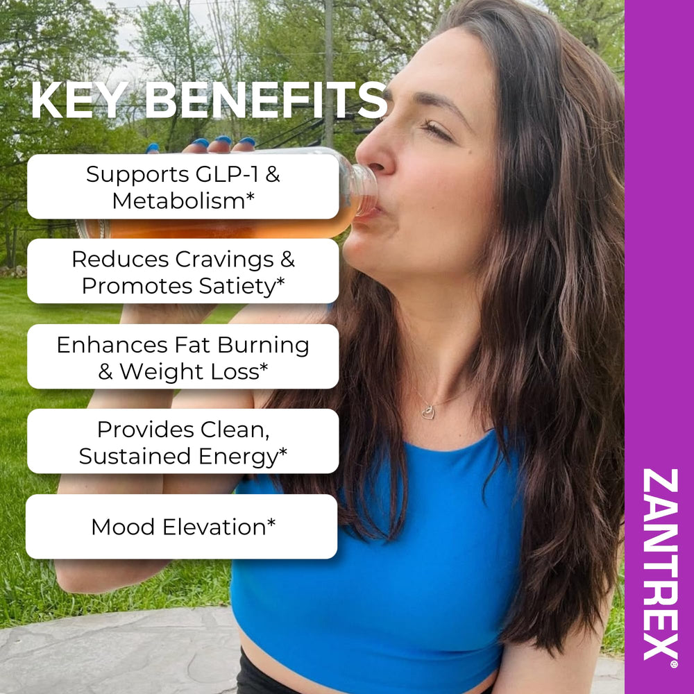 Zantrex SkinnyStix Berry powder being poured into water for a refreshing beverage.