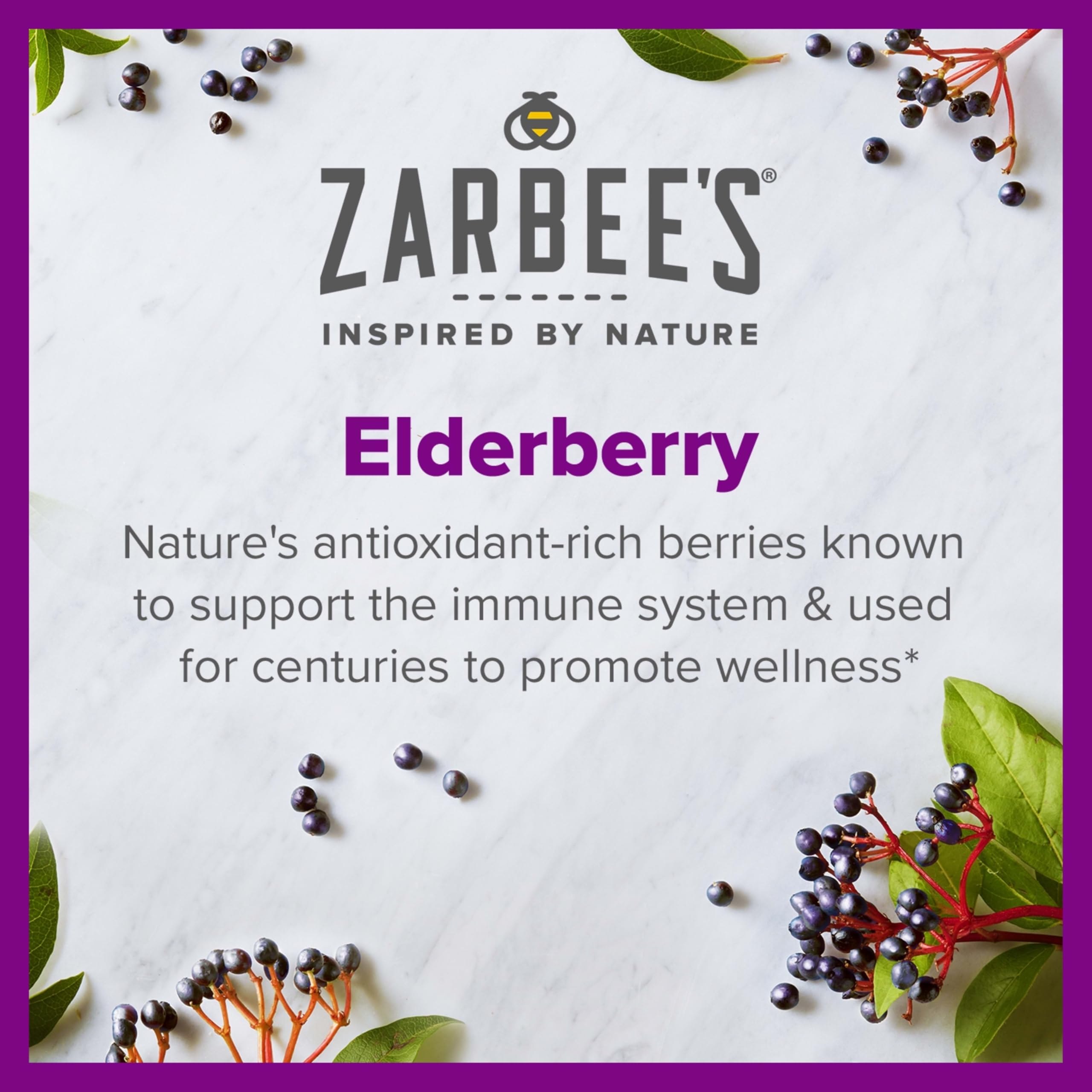 Spoon pouring Zarbee's elderberry syrup into a cup