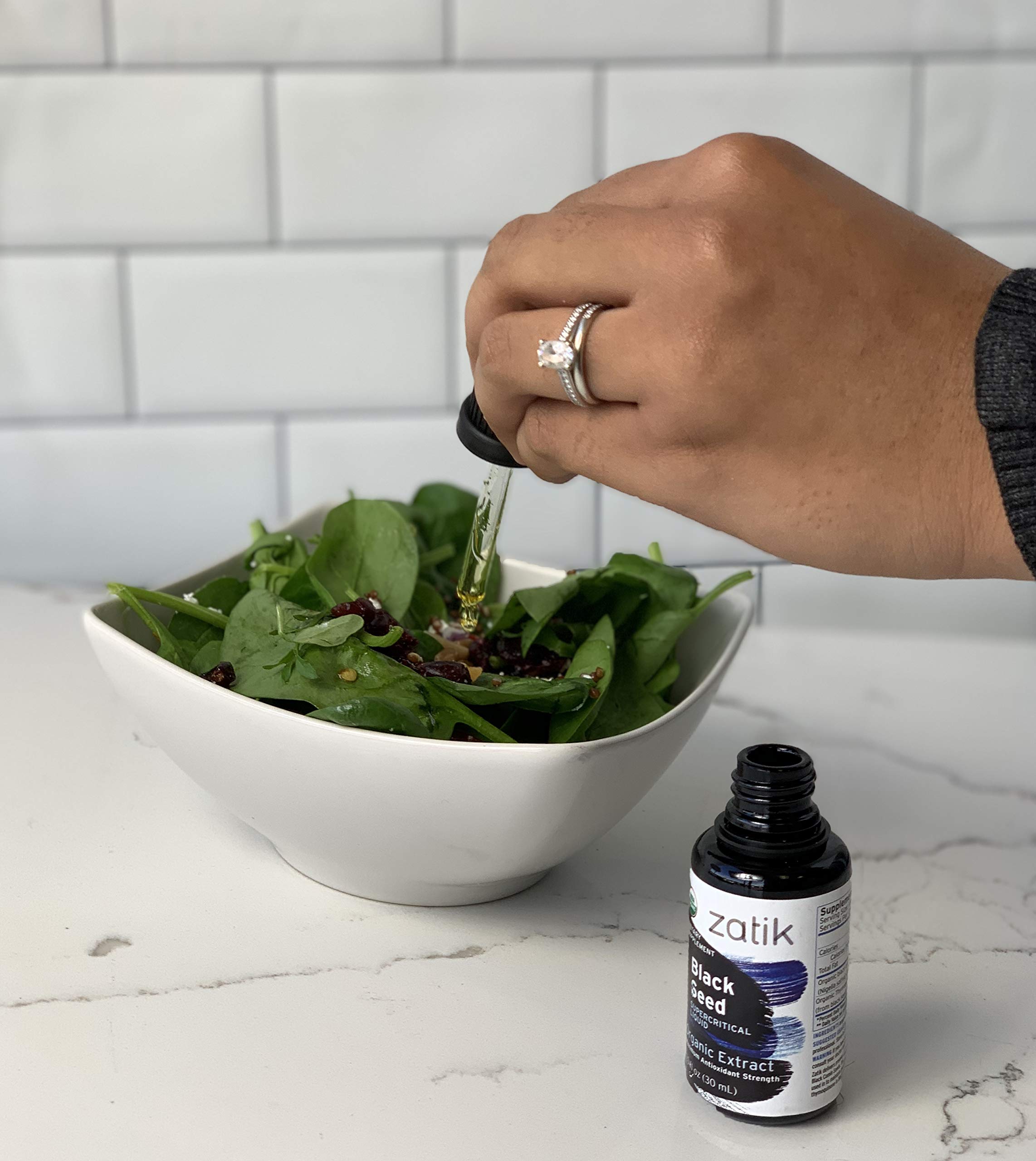 Zatik extract highlights phytosterols and thymoquinone content for antioxidant potential.