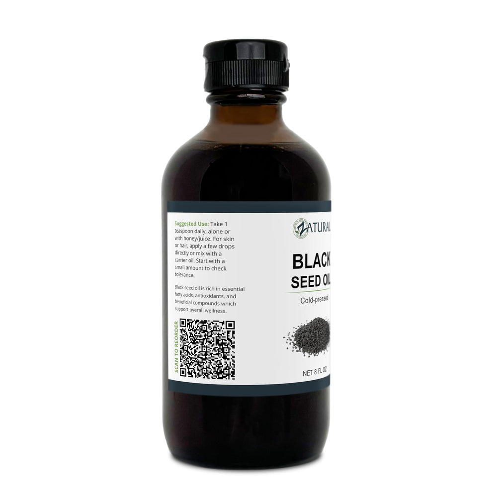 Zatural black seed oil bottle beside smoothie ingredients for everyday routines.