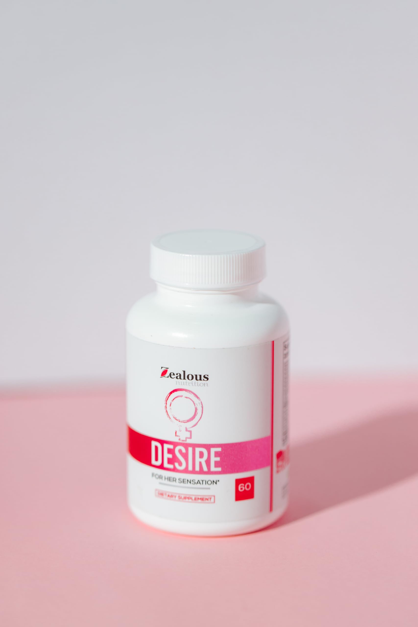 Zealous Nutrition Desire tablet closeup hints at herbal blend quality.