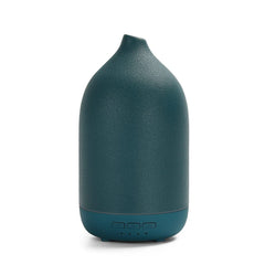 ZEIGGA LAB ceramic-top diffuser releases a gentle aroma for relaxed spaces.