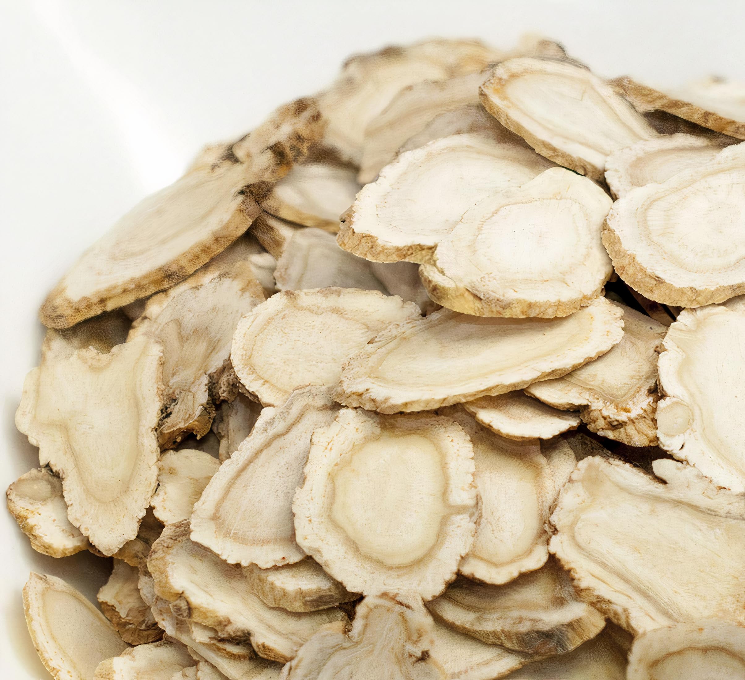 Zen Ginseng dried slices closeup ideal for flavorful tea or broth.