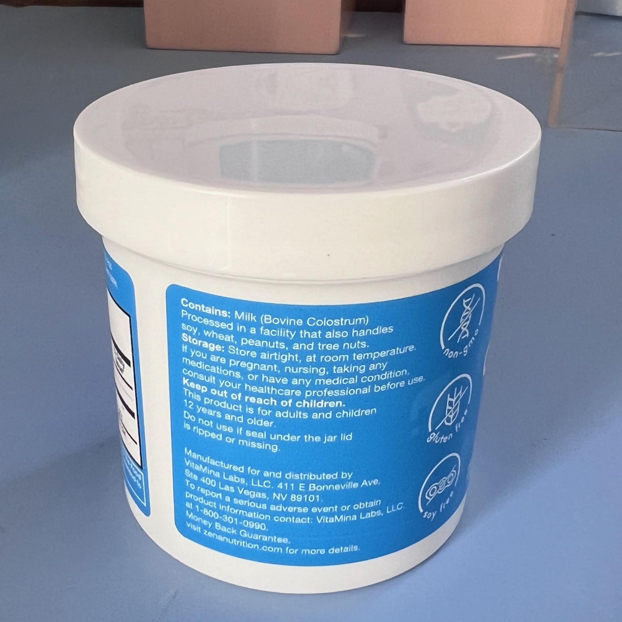 Zena Nutrition bovine colostrum powder with third-party test badge reinforces safety and transparency.