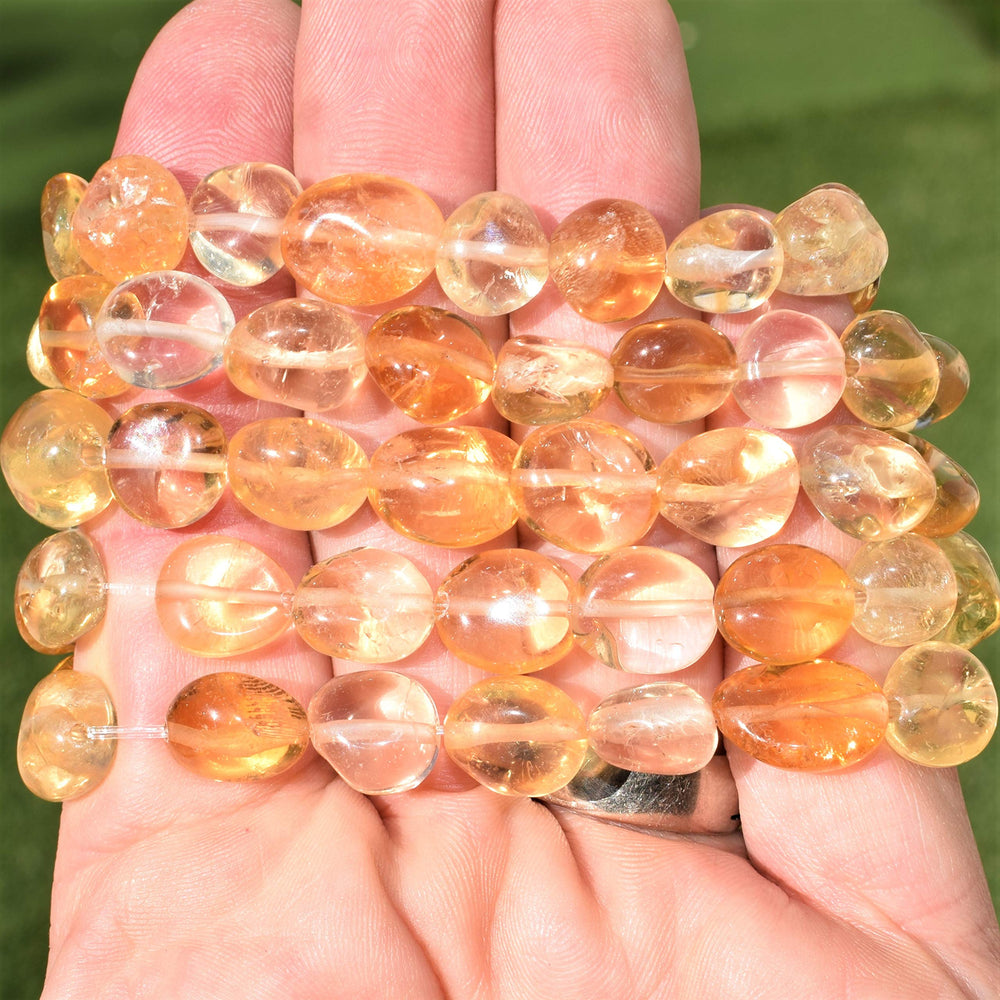 Zenergy Gems Natural citrine beads detail highlighting radiant positivity.
