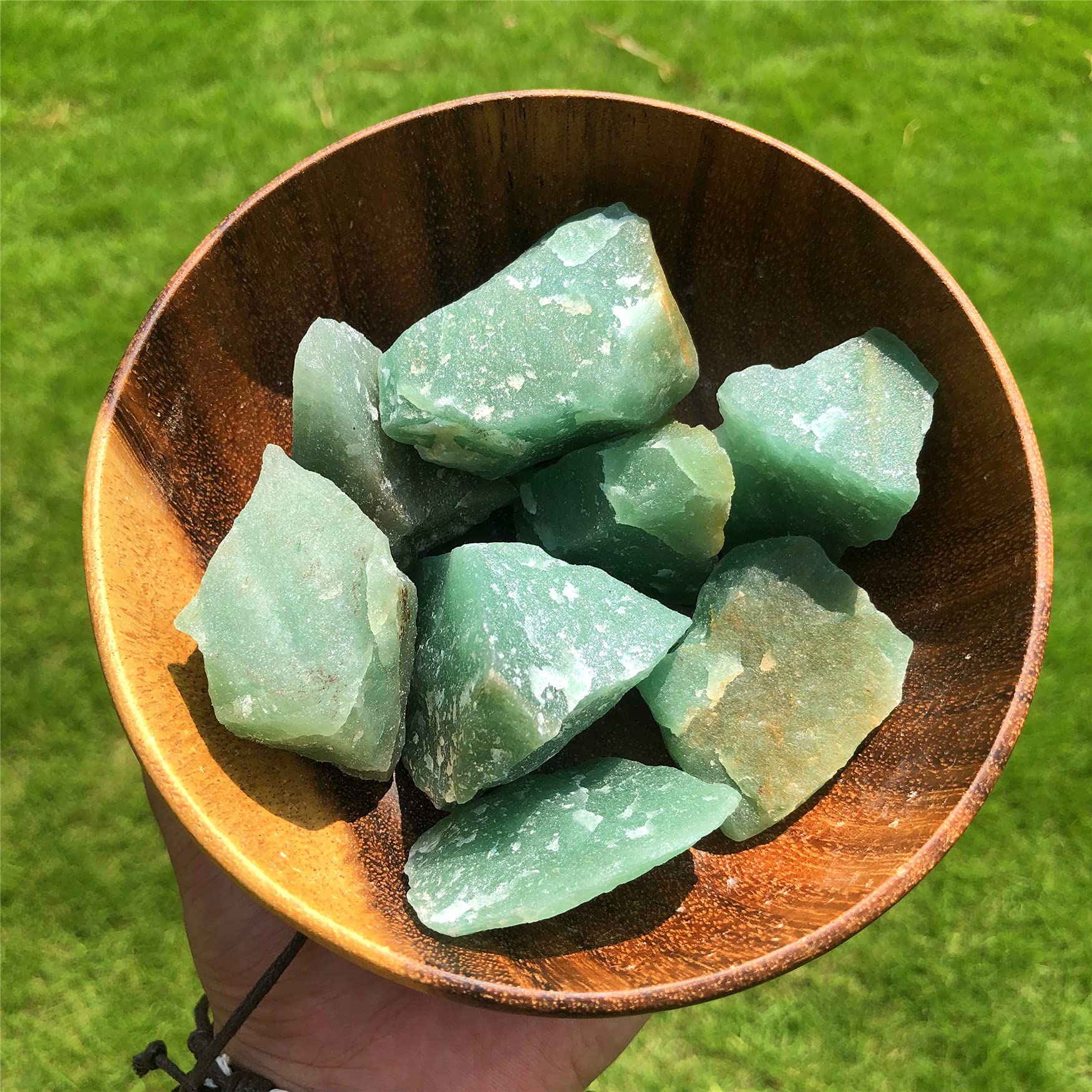 Zenkeeper green aventurine rough stone close-up showing natural texture for meditation.