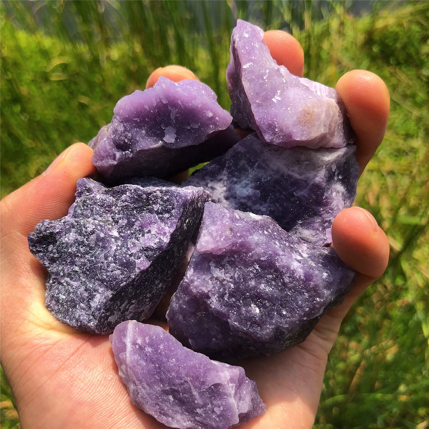 Large Zenkeeper Lepidolite stone on display showing rich purple hue.