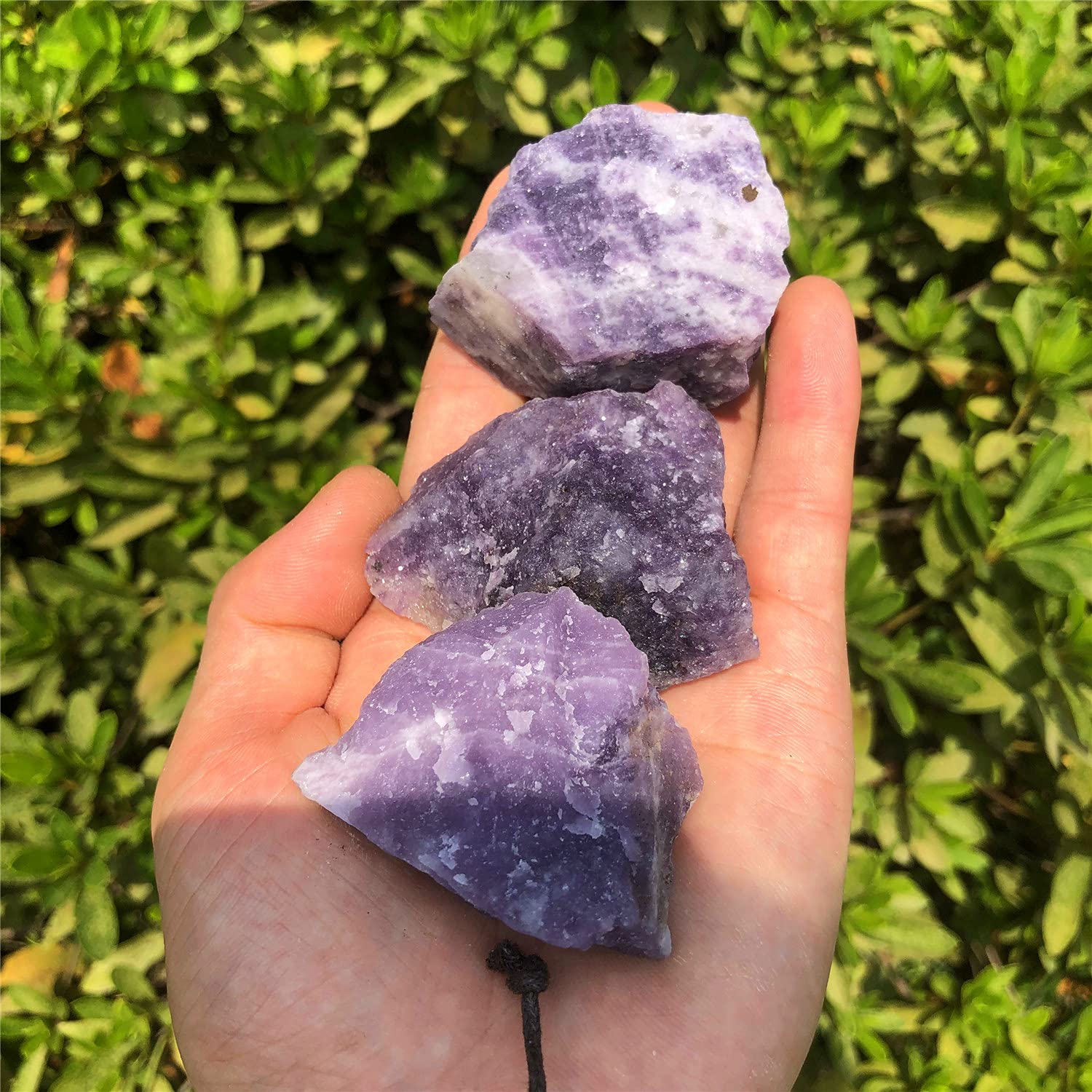 Rough Lepidolite pieces ideal for meditation and energy work.