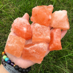 Zenkeeper orange Himalayan salt crystal close-up showcases natural color for ambient decor.