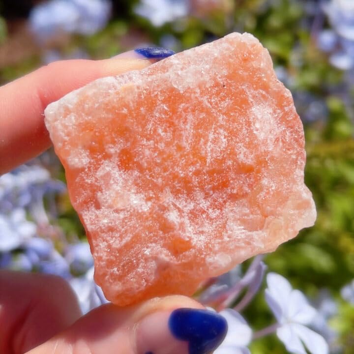 Zenkeeper orange salt crystal glows softly as a natural nightlight for cozy spaces.