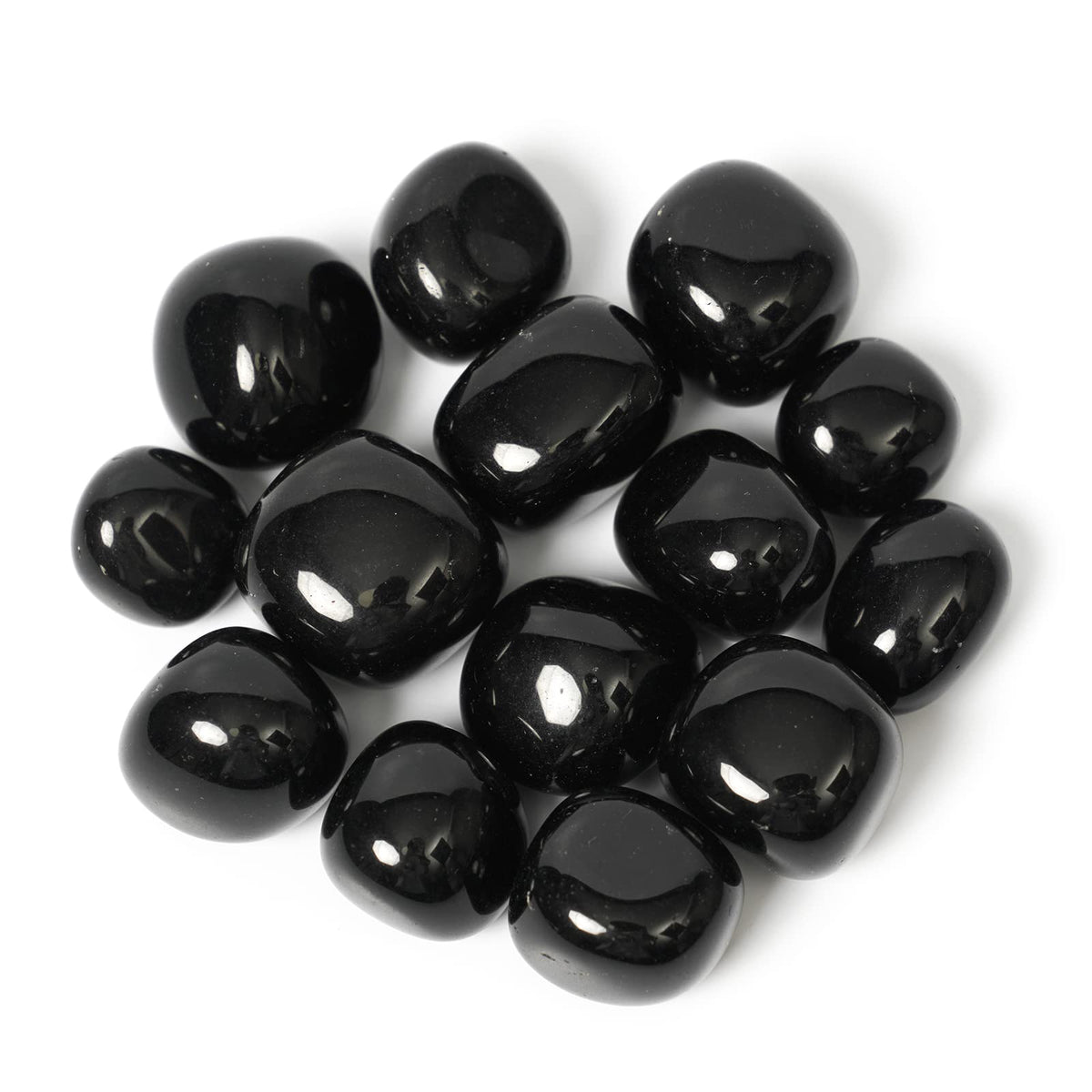 ZenQ black obsidian stones in a collection, ideal for grounding rituals.