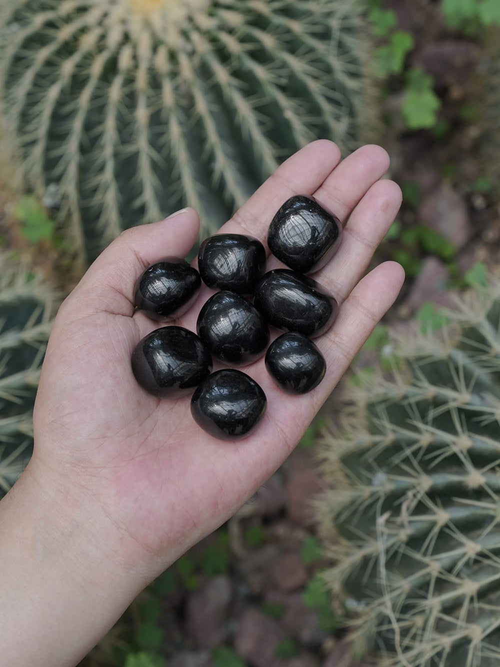 ZenQ obsidian stones from Mexico show natural volcanic glass texture.