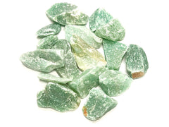 Close-up of Zentron Green Aventurine marbling on stones for jewelry design.