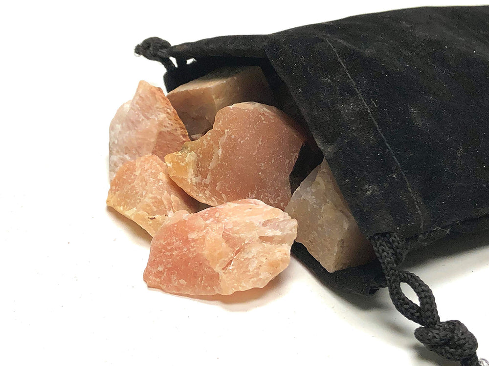 Close-up of Zentron peach aventurine stones showing color and texture for jewelry.