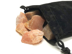 Close-up of Zentron peach aventurine stones showing color and texture for jewelry.