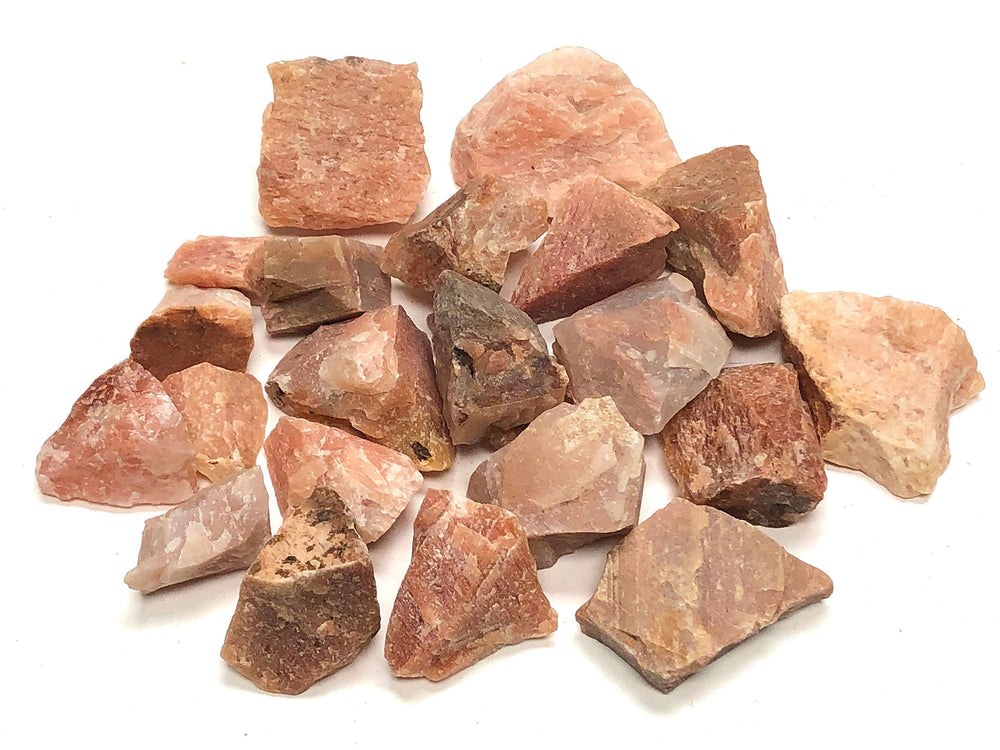 Zentron peach aventurine rough stones in a half-pound bag ready for tumbling.