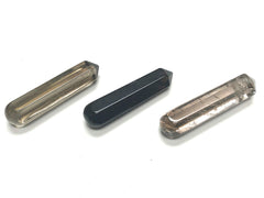 Zentron smoky quartz wand 60mm, showcasing natural color and tactile facets for display