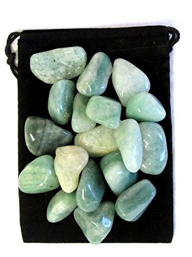 Close-up of Zentron green aventurine stones in velvet pouch for easy storage.