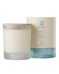 Zents Water candle in frosted jar enhances living room ambience