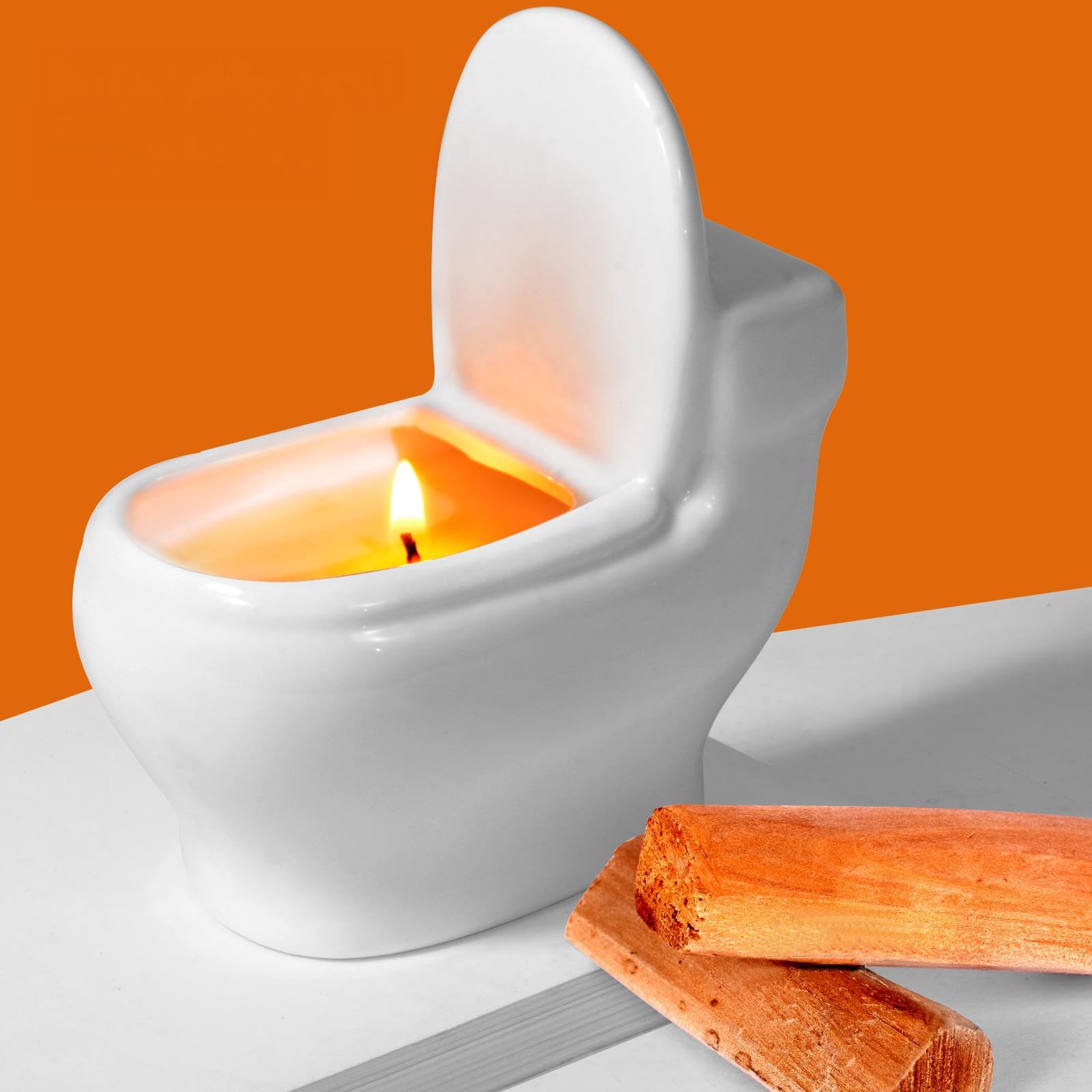 Zhanghe toilet-shaped candle with sandalwood scent enhances humor and ambient fragrance in any room.