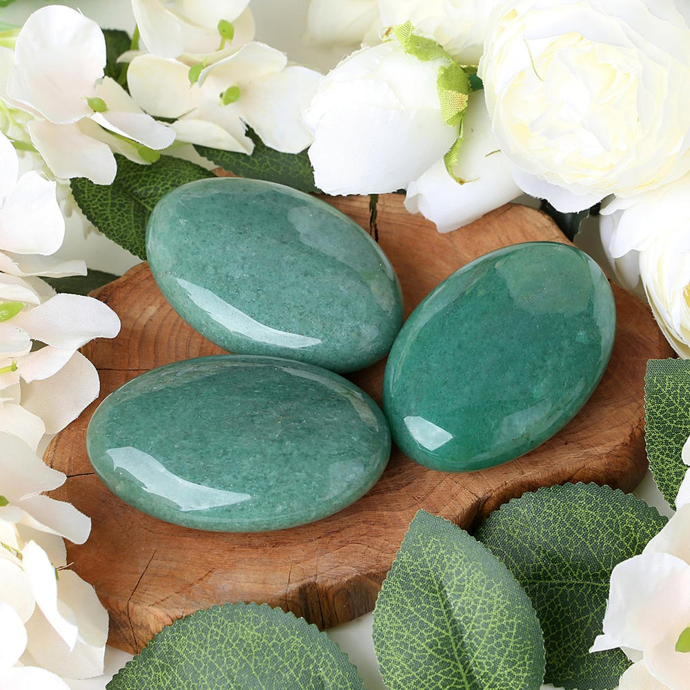 ZHIYUXI hand-holding green aventurine palm stone for calm energy.