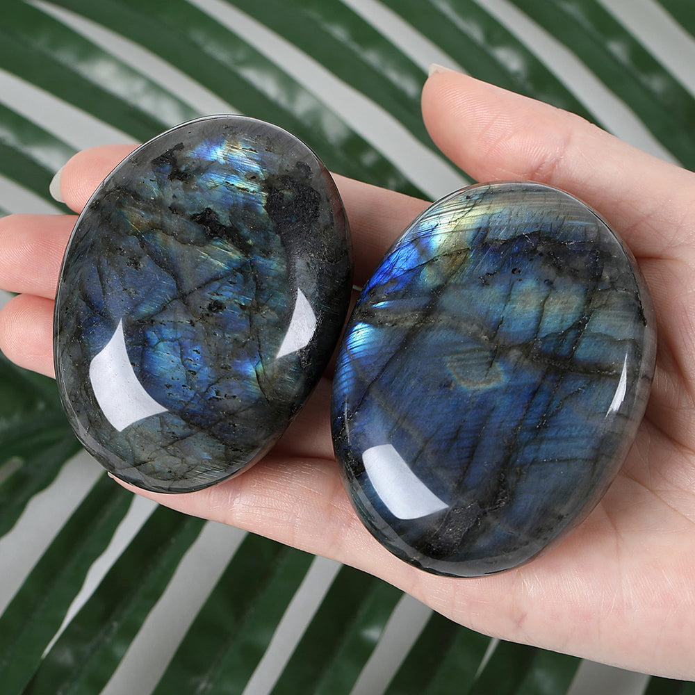 Close-up of polished Labradorite surface on ZHIYUXI palm stone.