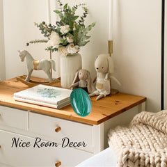 ZHIYUXI Malachite palm stone on a desk as decorative energy balancing accent.