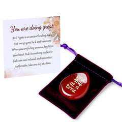 ZHIYUXI One Day at a Time thumb worry stone in hand for a calming moment