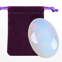 ZHIYUXI Opalite palm stone oval held for calming grip and mindful focus.