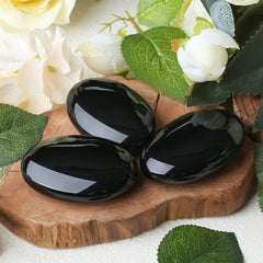 ZHIYUXI palm stone in hand for anxiety relief and grounding.