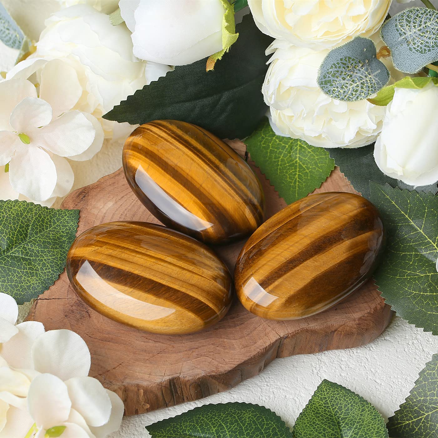 ZHIYUXI tiger's eye palm stone on desk as energy-balancing decor