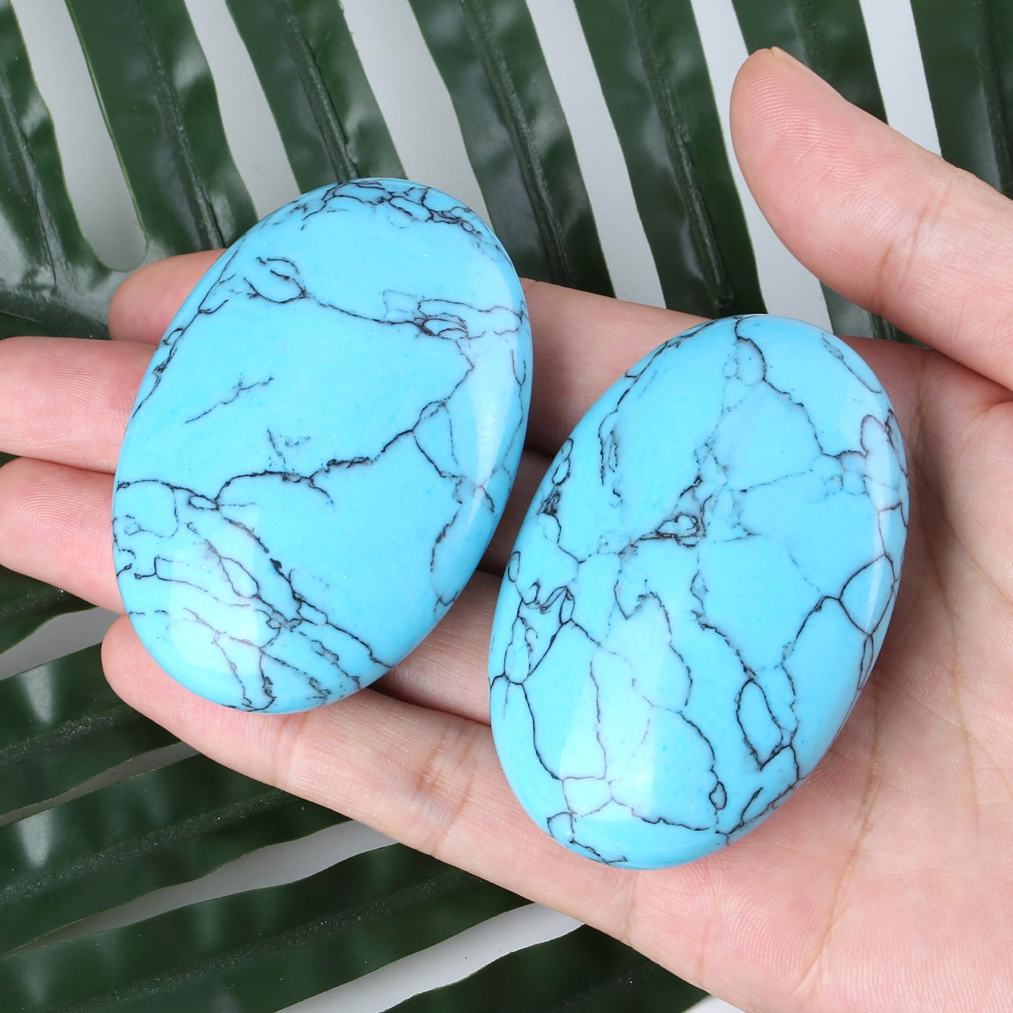 Turquoise oval palm stone used during meditation by ZHIYUXI