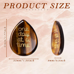 ZHIYUXI worry stone in hand front view, promoting gentle grounding during stressful moments.