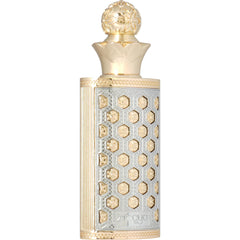 Zimaya Nojoum fragrance oil pour, showcasing rich amber notes and smooth texture.