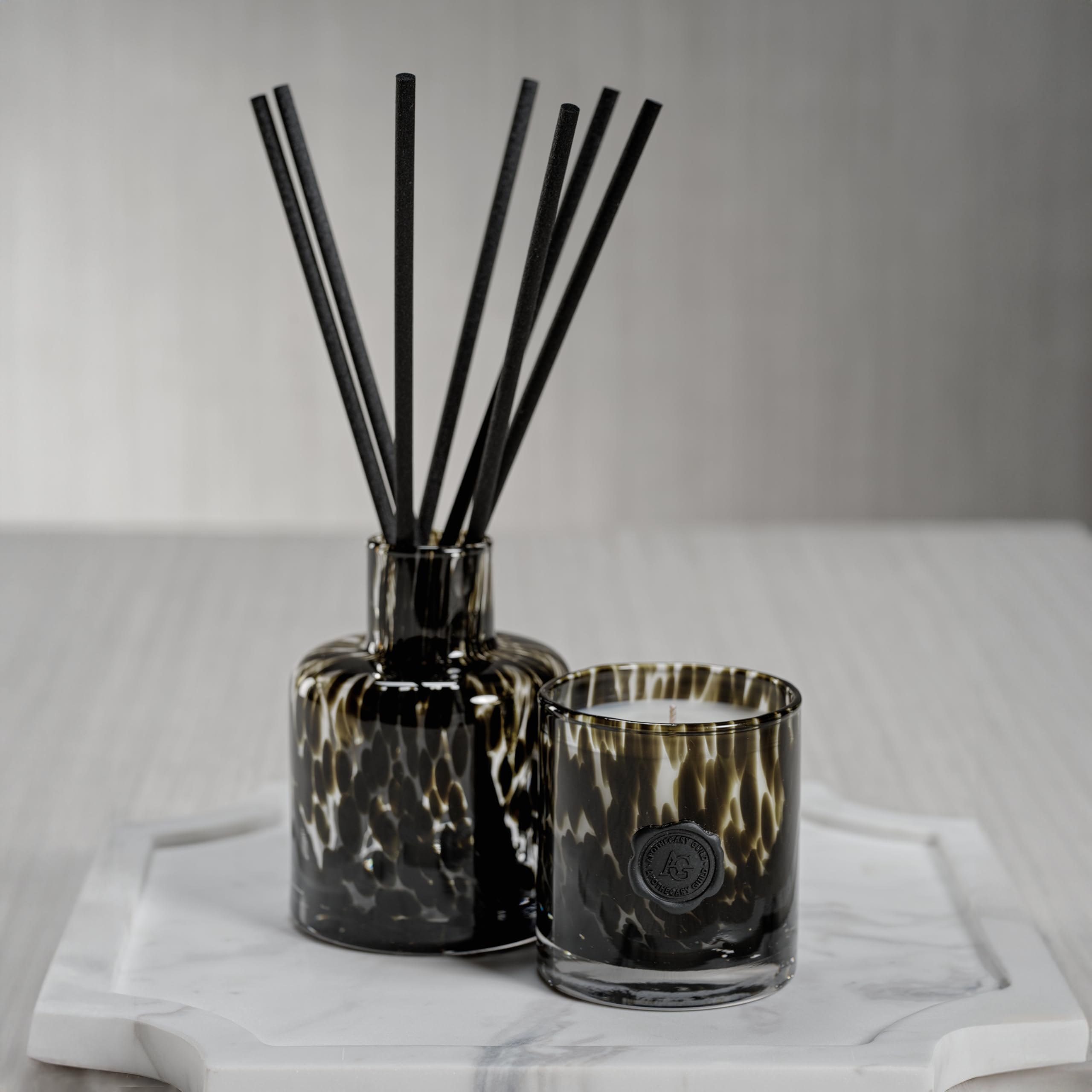 Zodax Apothecary Guild Black Fig Vetiver oil bottle enhances scent diffusion.