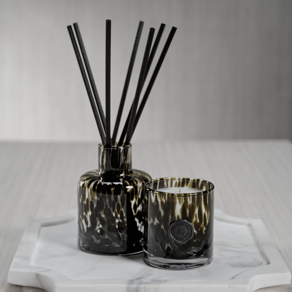 Zodax Apothecary Guild Black Fig Vetiver oil bottle enhances scent diffusion.