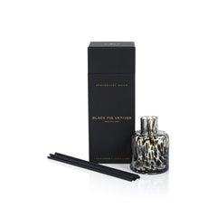 Zodax Apothecary Guild reed diffuser set with reeds ready to fragrance a room.