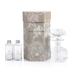 Zodax Grand Casablanca porcelain diffuser with flower design enhances living room ambiance.