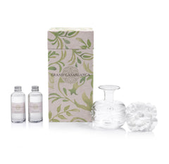 Zodax Grand Casablanca diffuser porcelain flower adds decorative charm to a bedroom