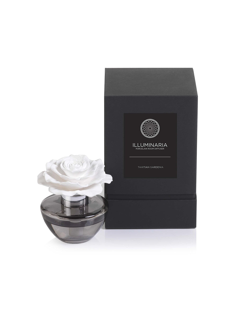 Zodax Illuminaria porcelain flower diffuser with glass bottle enhances room fragrance.