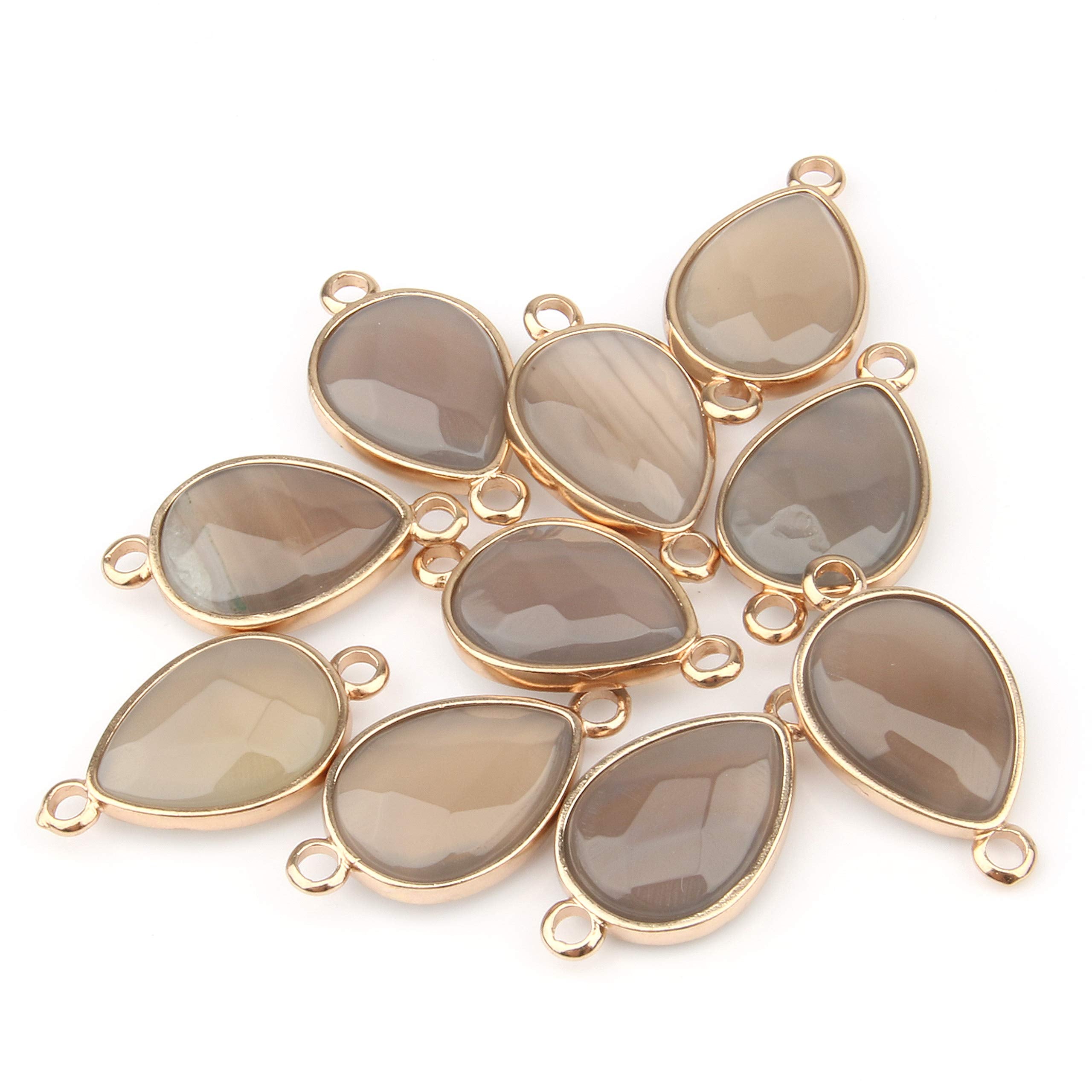 Zotoone natural stone pendant links show subtle color variation for unique designs.