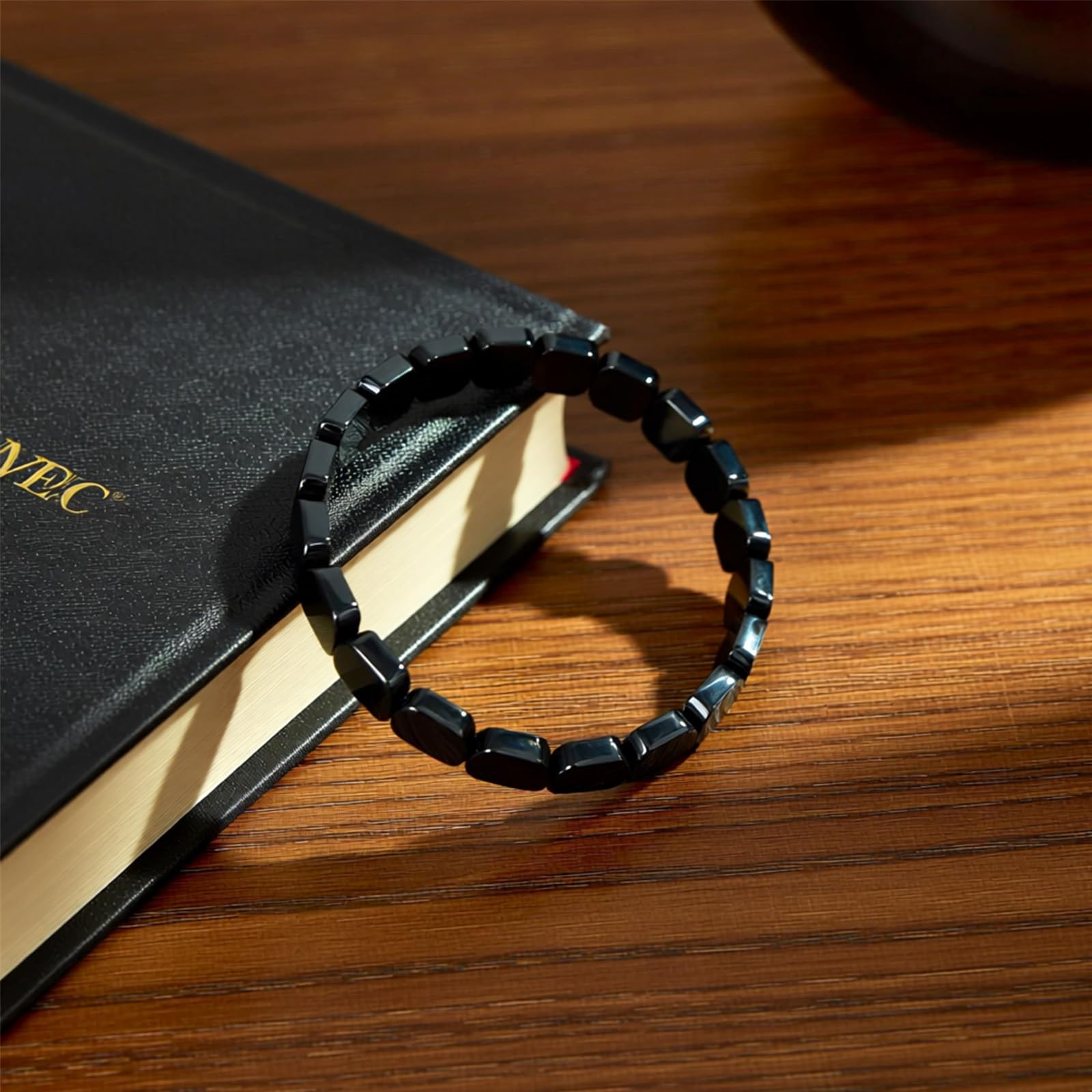 ZOYYE hematite bracelet natural texture close-up highlights stone detail for versatile style.