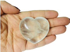 Zungtin carved crystal heart used for chakra balancing and Reiki energy flow.