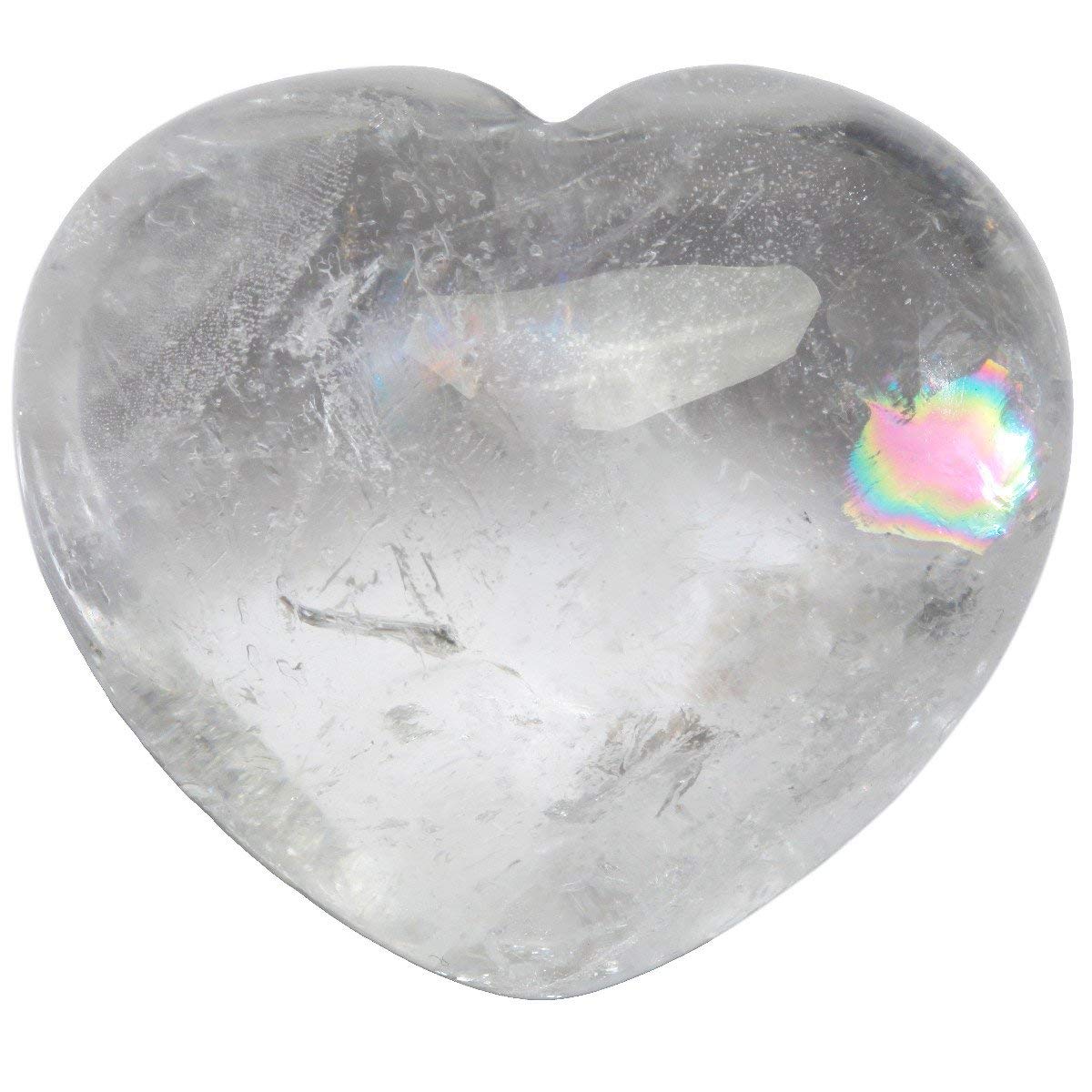 Zungtin healing crystal heart palm stone held in hand for meditation and balance.